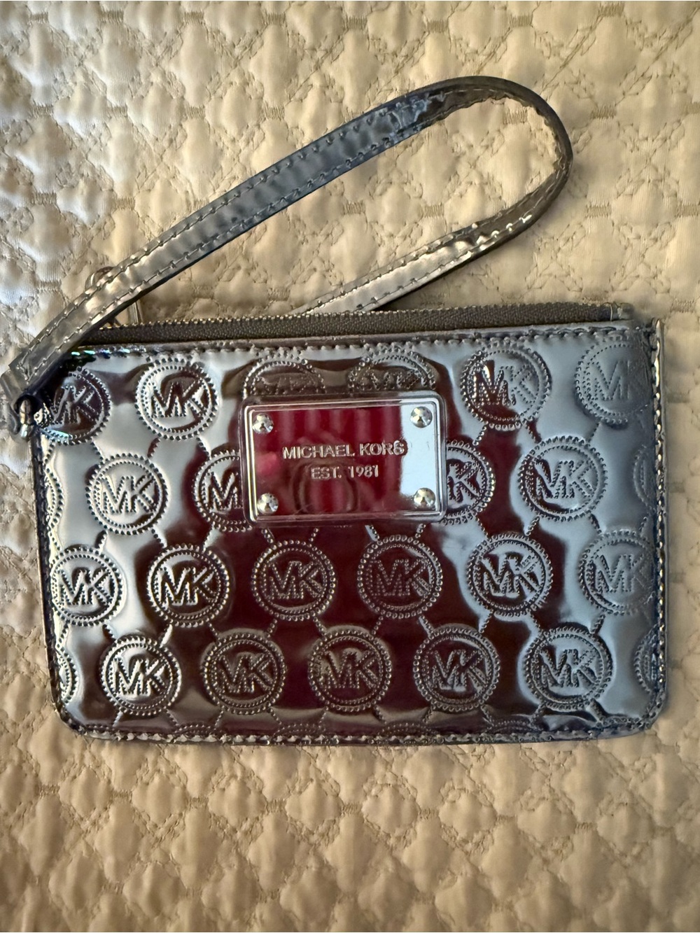 Michael Kors Patent Embossed Wristlet in Silver